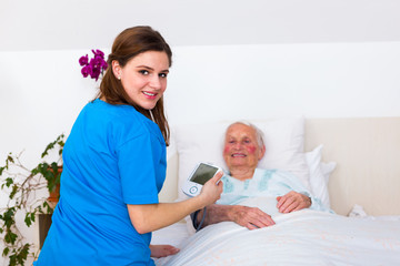 Obraz premium Home care - blood pressure measuring