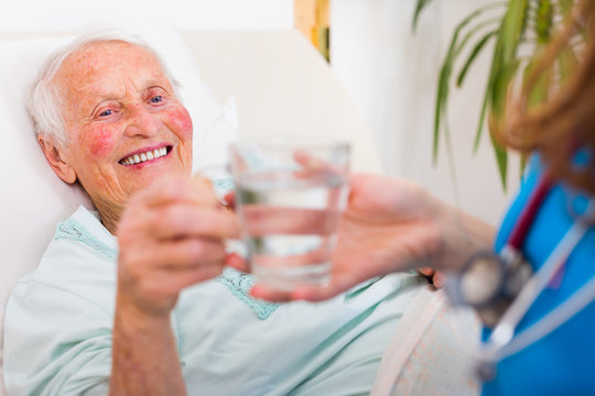 Drinking senior patient