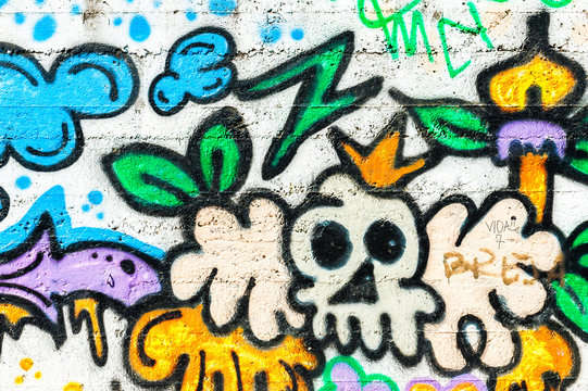 Graffiti wall urban art. Abstract creative drawing fashion colors on the walls of the city.