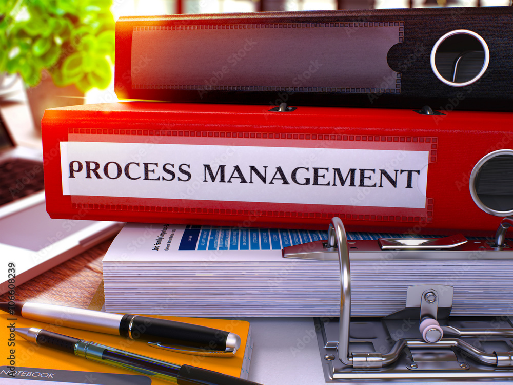 Poster process management - red office folder on background of working table with stationery and laptop. pr