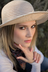 Portrait of a girl in a ladies' hat