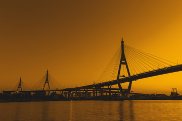 Silhouette Bhumibol Bridge or Industrial Ring Road bridge at twi