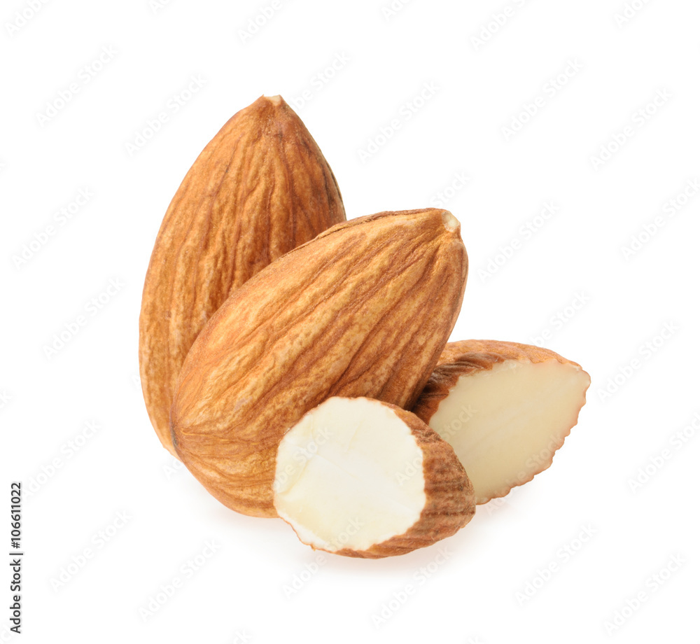 Wall mural almond nuts isolated on white background