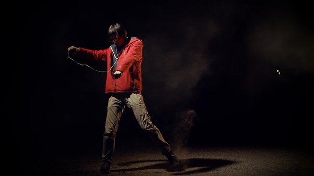 Man dancing Hip-hop in night  smoke urban