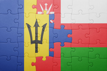 puzzle with the national flag of barbados and oman