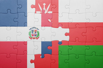 puzzle with the national flag of dominican republic and oman