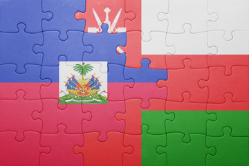 puzzle with the national flag of haiti and oman