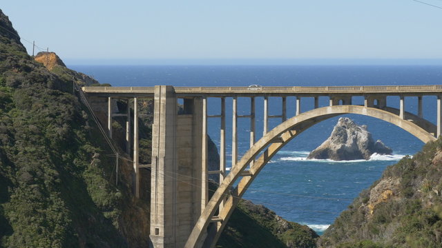 Panning view of Bixby Bridge in the Big Sur area of Central California.