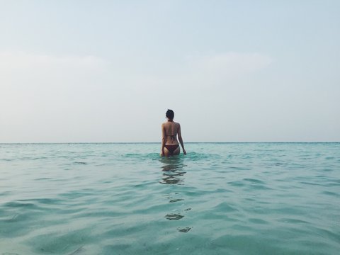 standing amidst the sea