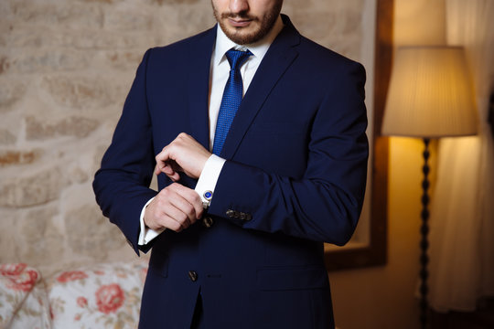 Gentlemans hands with cufflinks