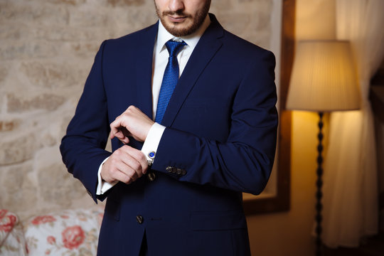 Gentlemans hands with cufflinks