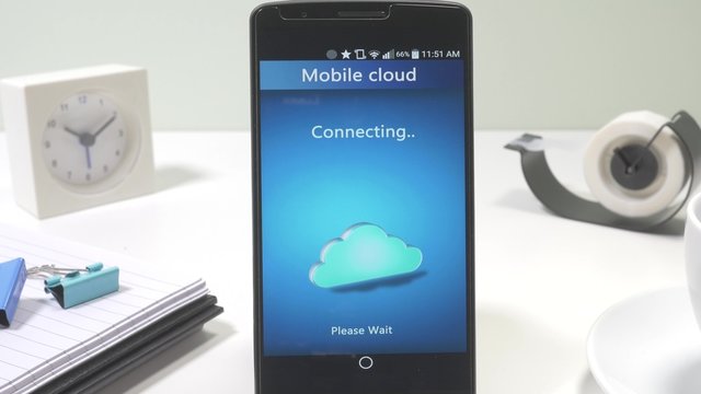 Connecting to the cloud storage app with a smartphone.