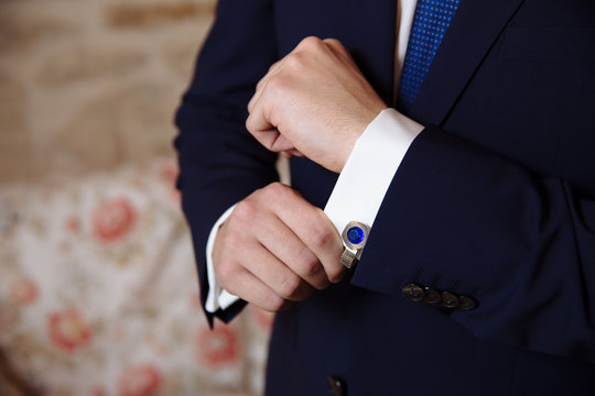 Gentlemans hands with cufflinks