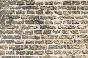 Brick background formed by a part of a church wall in Delft, Netherland.