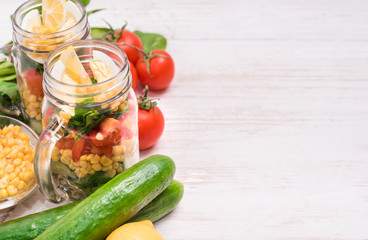 Homemade healthy salad in glass jar. Vegetarian concept. Background.