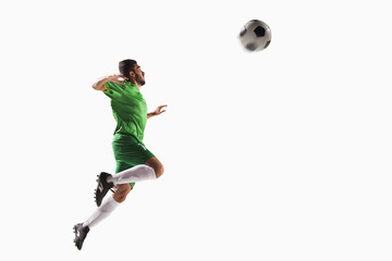 Fototapeta premium Athlete heading soccer ball