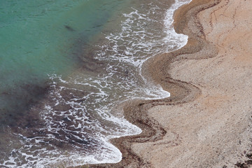 Wave patterns in the sand