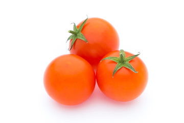 Tomato on the white isolatd background.