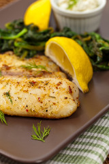 Fish with Sauteed Spinach. Selective focus.