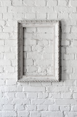 Blank frame on a white wall