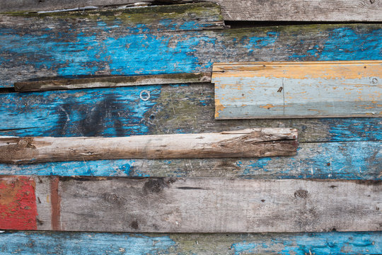 Vintage wood background. Grunge wooden weathered oak or pine textured planks. Grey, brown, blue rustic fence.