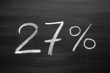 27 percent header written with a chalk on the blackboard