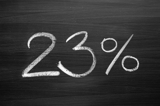 23 percent header written with a chalk on the blackboard