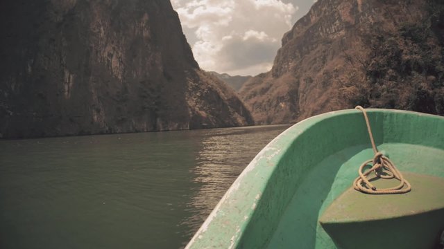Boat of tourists visiting Ca&ntilde;on del sumidero in Chiapas, Mexico.