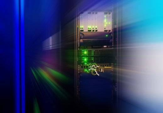 rack with telecommunications network equipment in the data center with blur