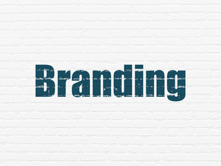 Advertising concept: Branding on wall background