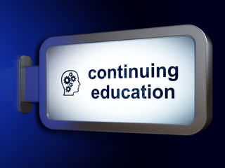 Learning concept: Continuing Education and Head With Gears on billboard background