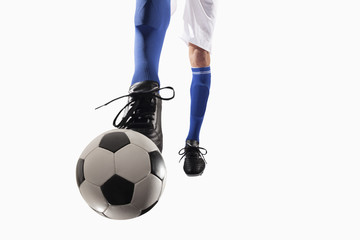 Fototapeta na wymiar Athlete kicking soccer ball