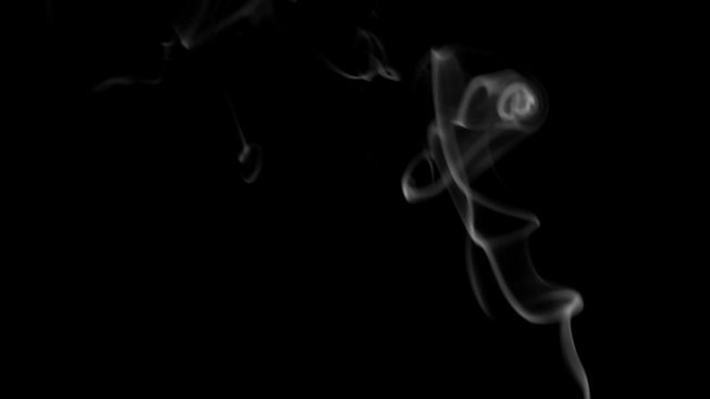 Footage white smoke on black background.