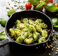 Gnocchi with herb pesto, delicious Italian vegetarian dish