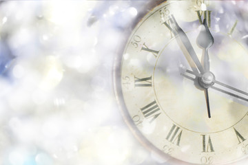 New Year's clock with shining background