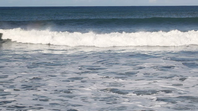 Ocean waves breaking at shore