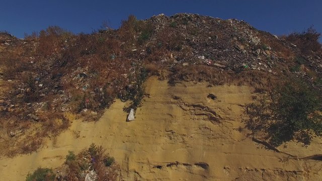 Quarry Slope Littered With Waste