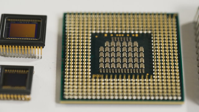 computer processor and electronic components on white background