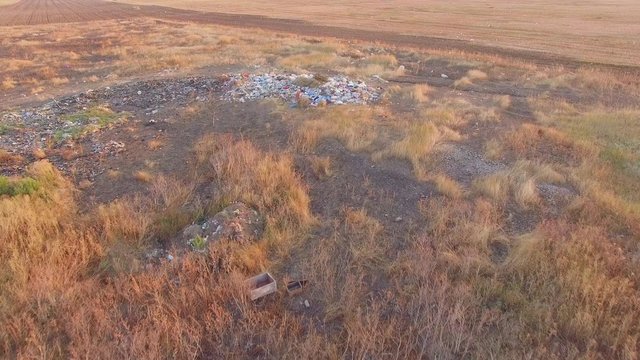 Field Littered With Garbage