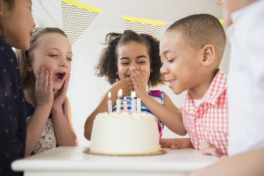 Children celebrating birthday together