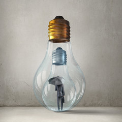 Businessman in electric bulb