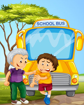 Bully boy picking on other boy in school bus