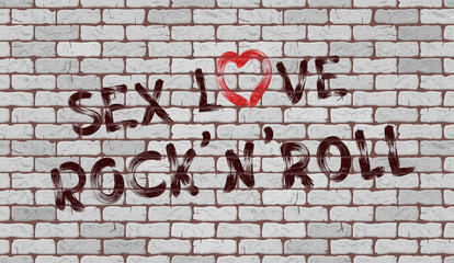 Inscription Sex love rock'n'roll on the wall