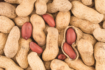 Many peanuts in shells, one upon the other