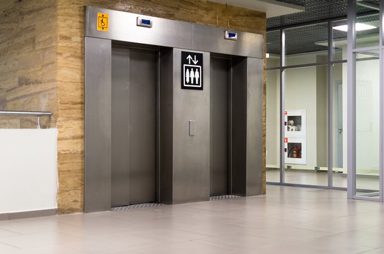 Metalic lift doors in an airport