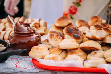 Dishes of the traditional Belarusian cuisine - fresh pastries an