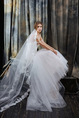 pretty bride in wedding dress posing