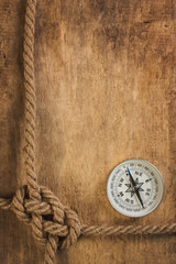 Fototapeta na wymiar Compass with a rope