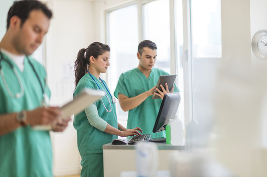 Hispanic nurses working in hospital