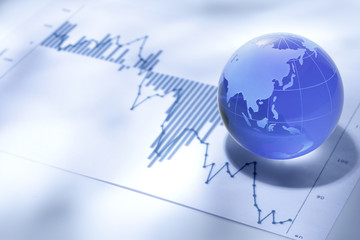 Fototapeta premium グローバルビジネス/ガラス製の地球とファイナンシャルチャート